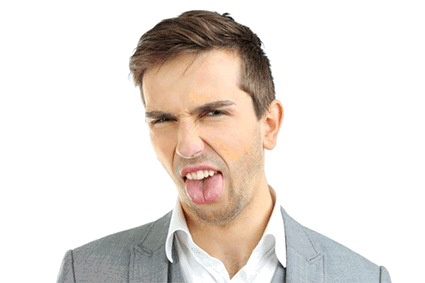 Man sticking his tongue out in disgust after tasting a bad e-juice flavor